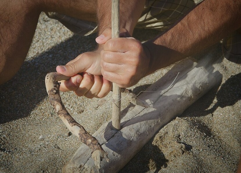 Making-Fire-With-a-Bow-Drill.